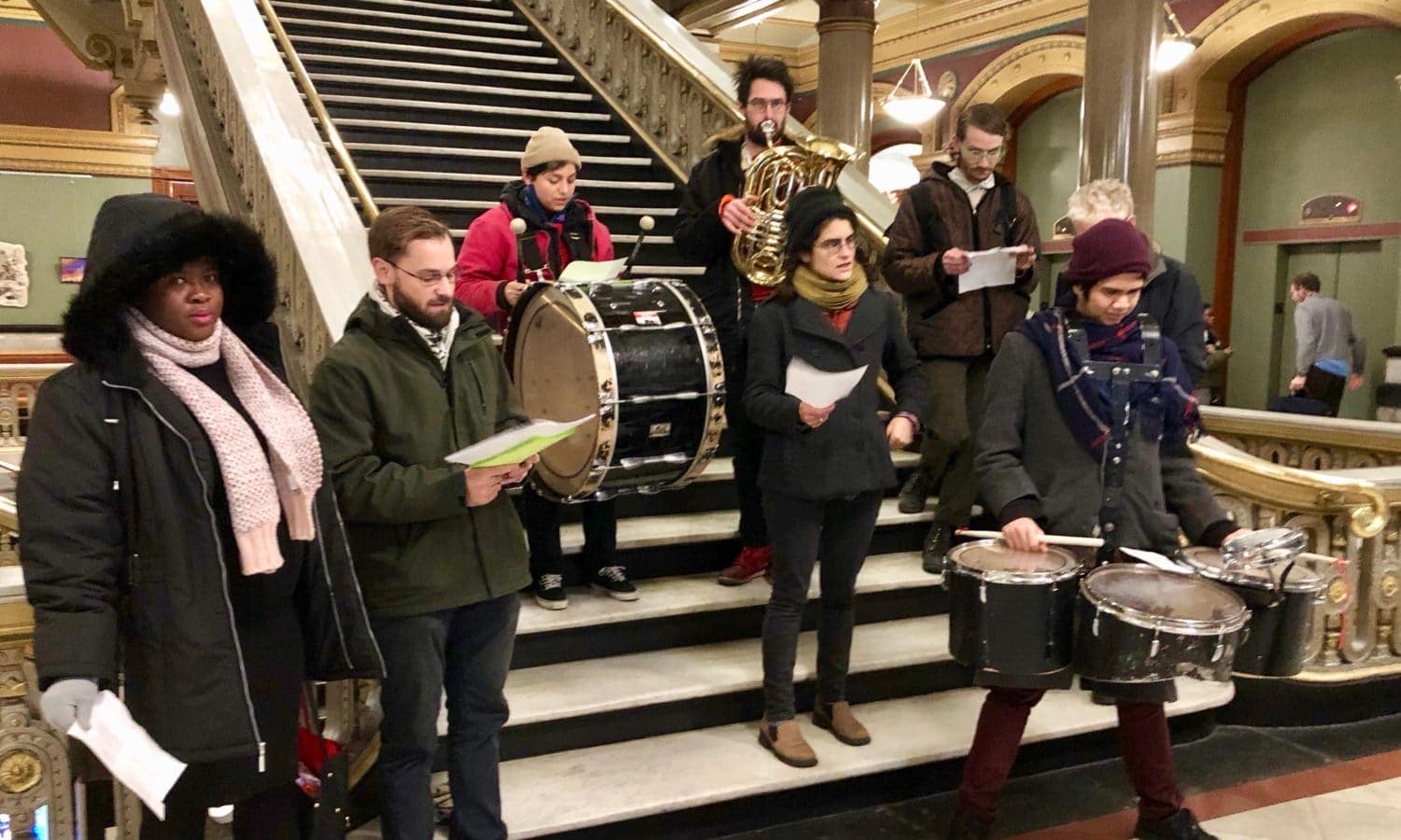 Christmas Carolers rebuffed at City Hall and RI Housing