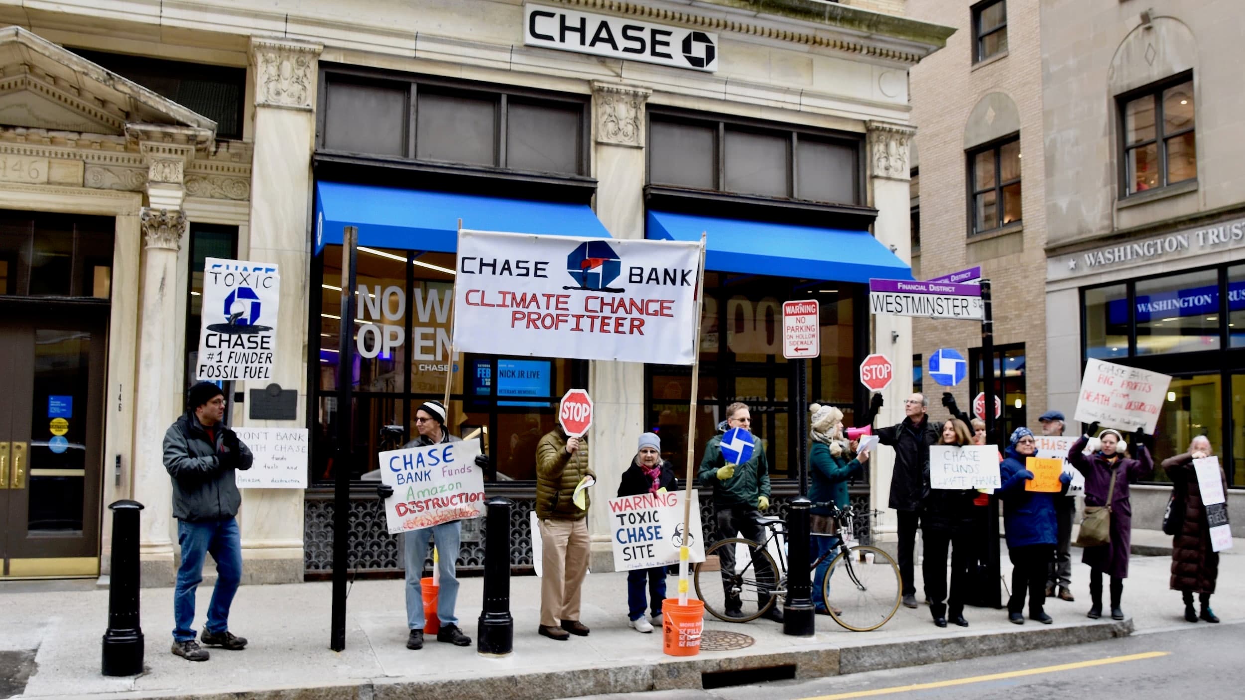 Climate Action RI shuts down Chase Bank ribbon cutting