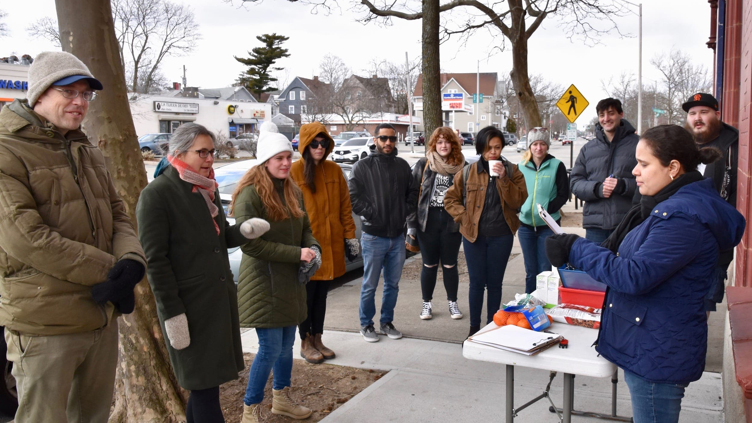 Door knocking against the proposed garbage transfer station in Providence