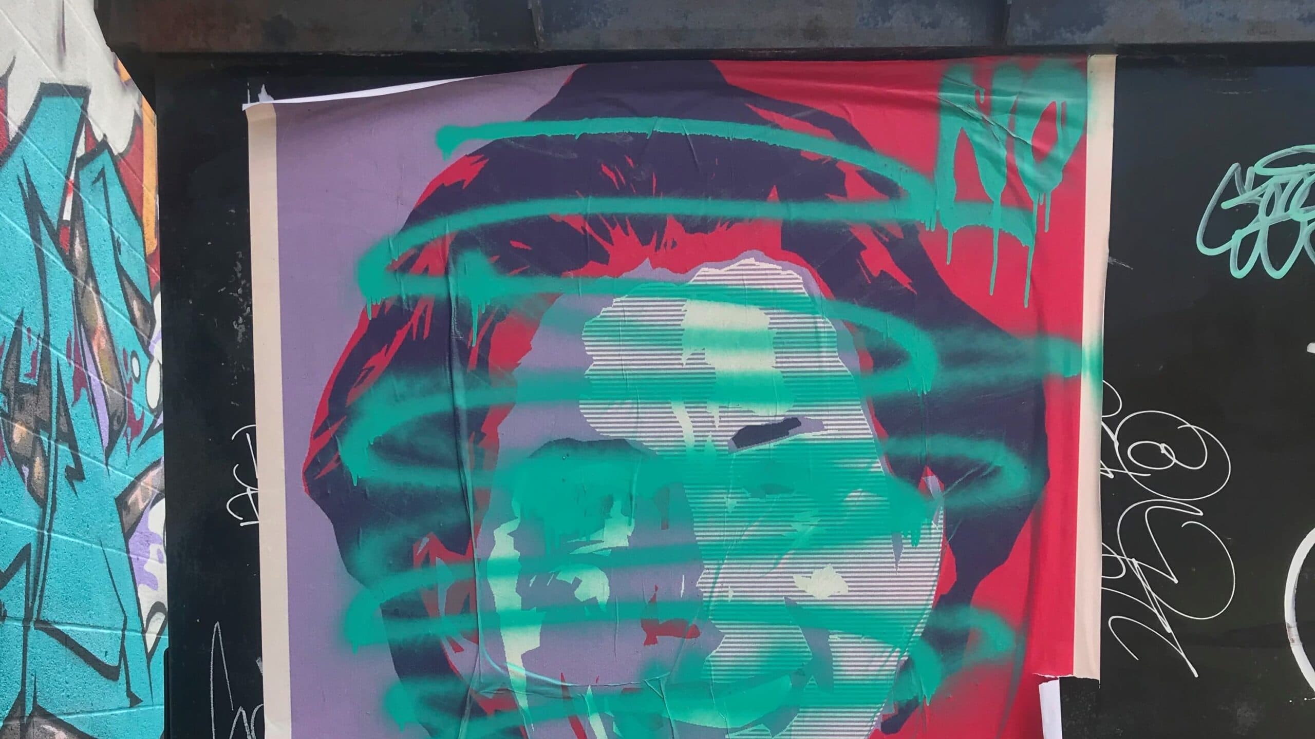 Street posters and car protests are both focused on Raimondo