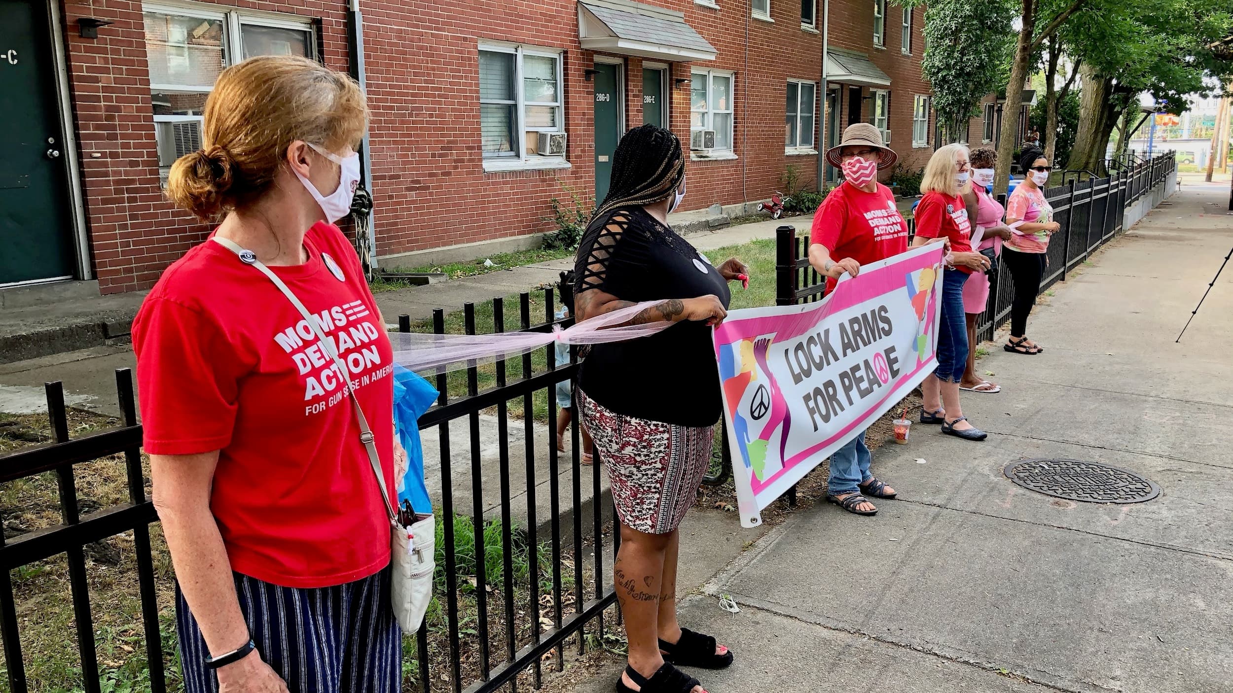 Lock Arms for Peace holds first in-person vigil since the start of the pandemic