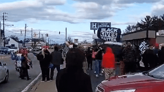 Counter-protester assaulted at 'Stand and Wave for Trump' event