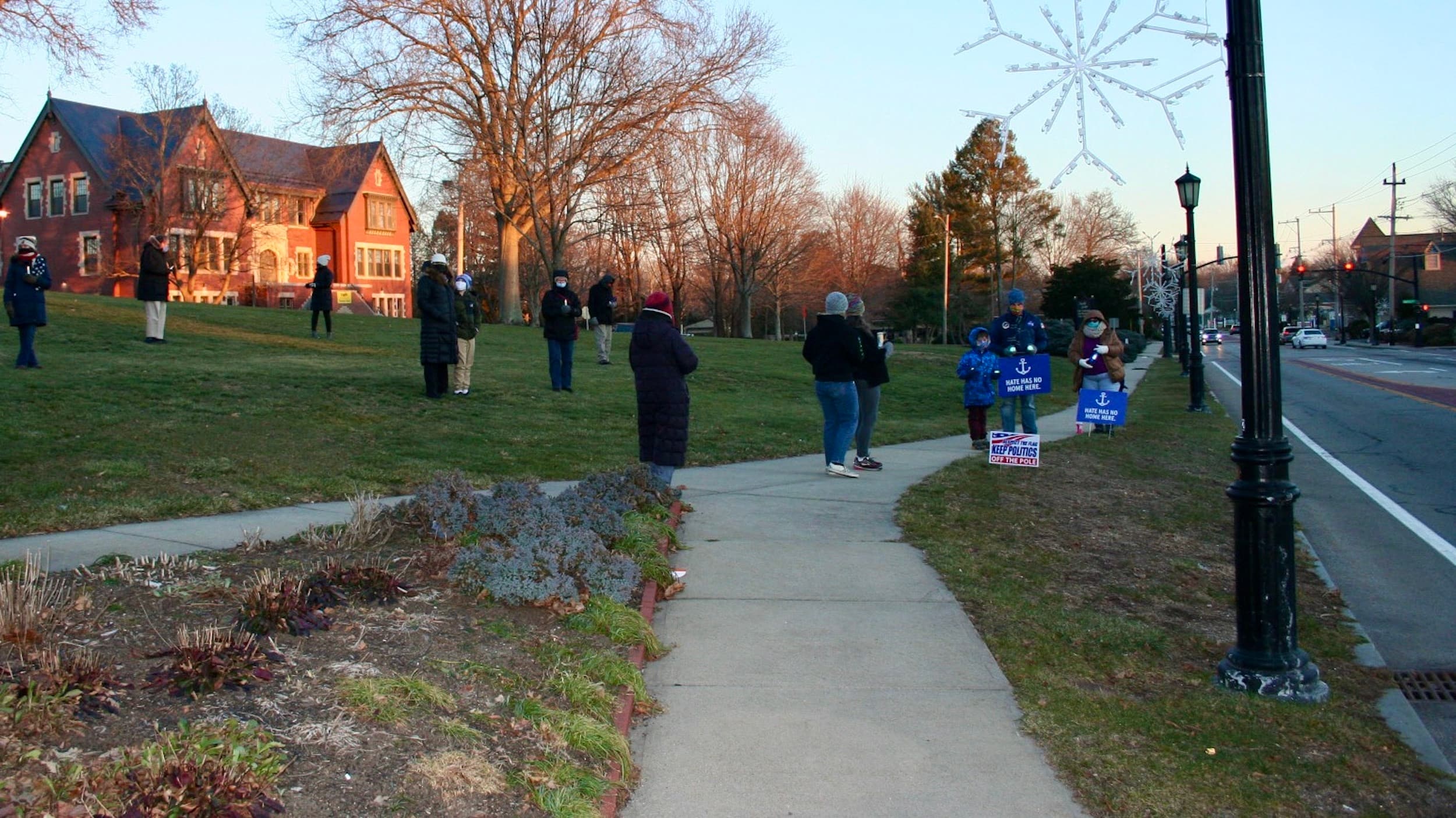 Illuminate our town with peace and love: A silent illuminated vigil in Barrington
