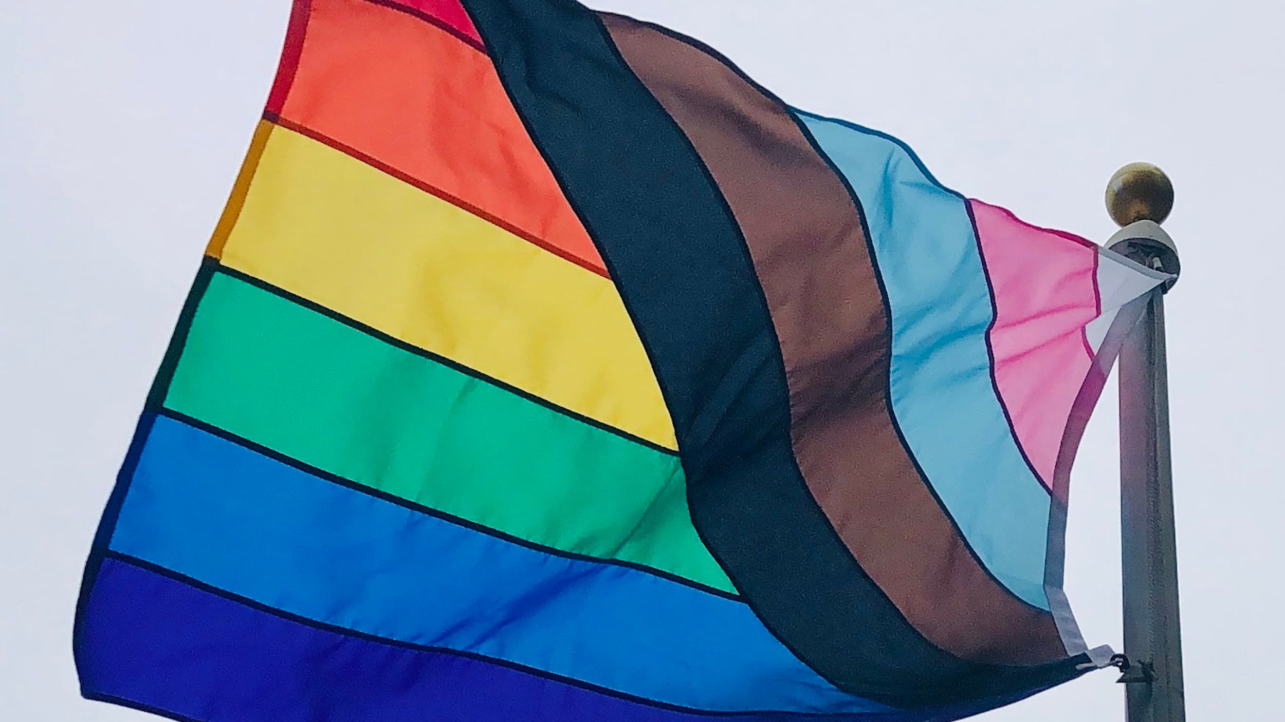 Ashley Delgado gives keynote as Central Falls raises Pride Flag