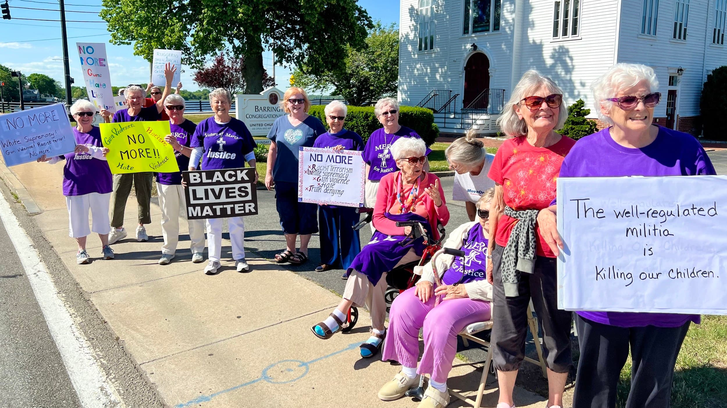 A protest in Barrington shouts: No more!