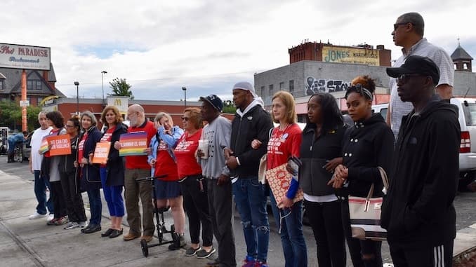 Locking arms for peace and against gun violence
