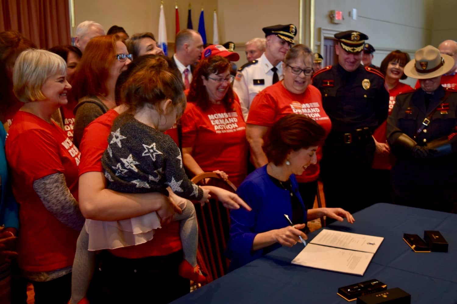 Governor Raimondo signs "red flag" policy, says legislation still needed