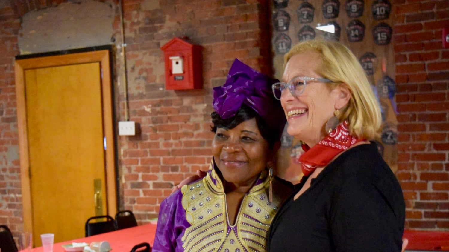 Henrietta White-Holder and Linda Finn receive Red Bandana Awards