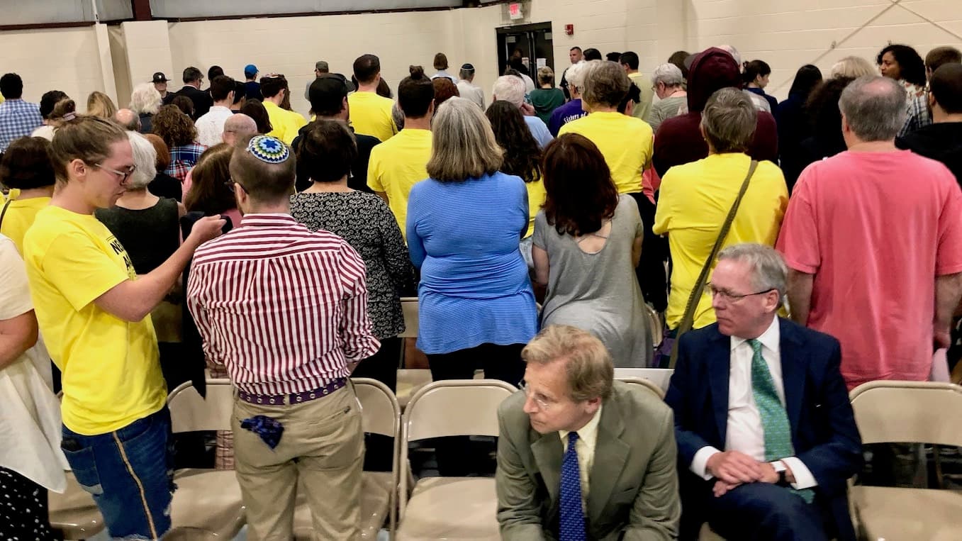 Wyatt board delays vote on forbearance agreement as protesters turn their backs