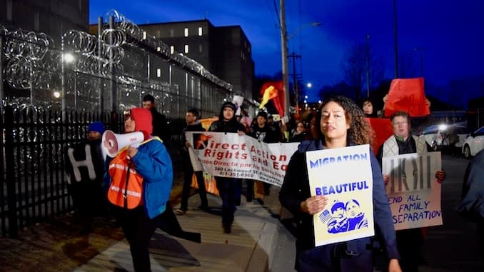 Protesters march from Central Falls City Hall to Wyatt Detention Center to call for an end to ICE detentions