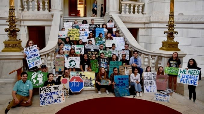 Students rally at the Rhode Island State House as part of the second International Climate Strike