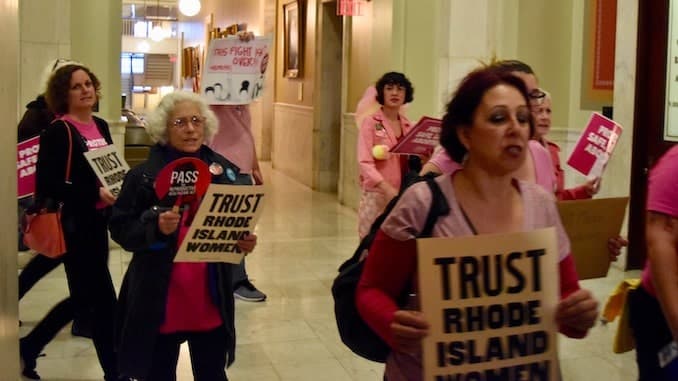 As a party is held for Senator Archambault, The Womxn Project stays focused on protecting reproductive rights