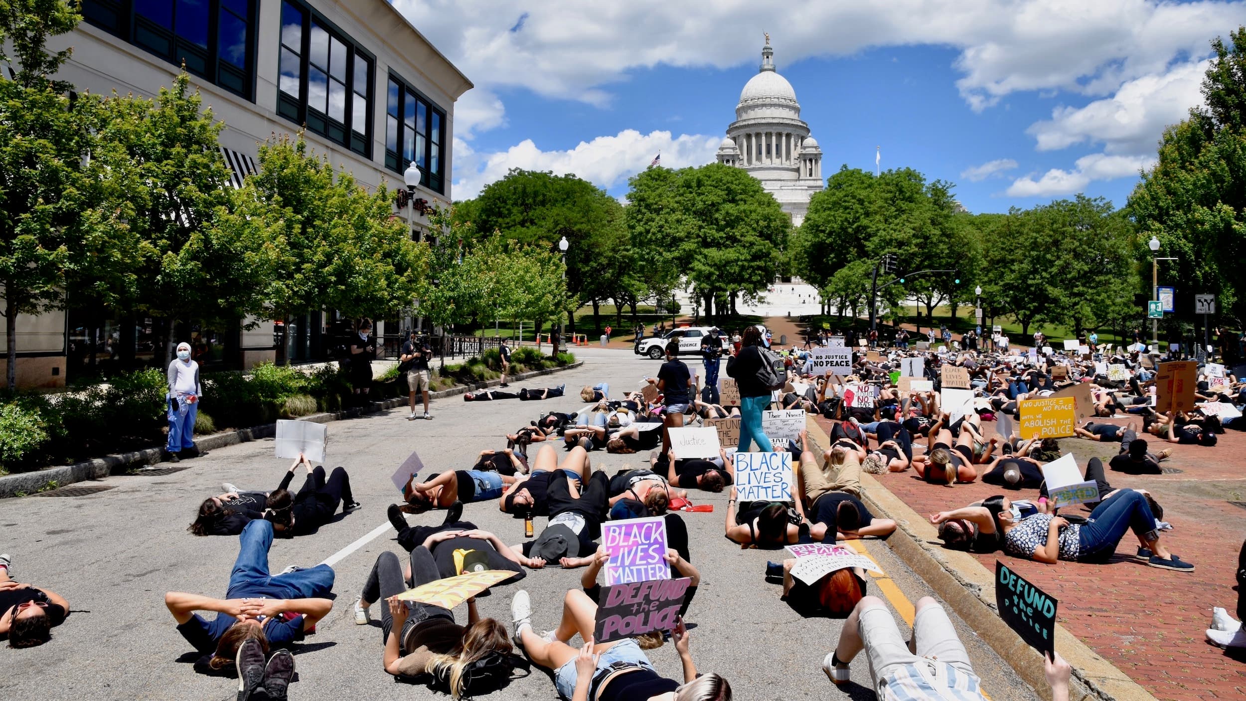 Youth protest in support of Black lives stages die-in outside State House