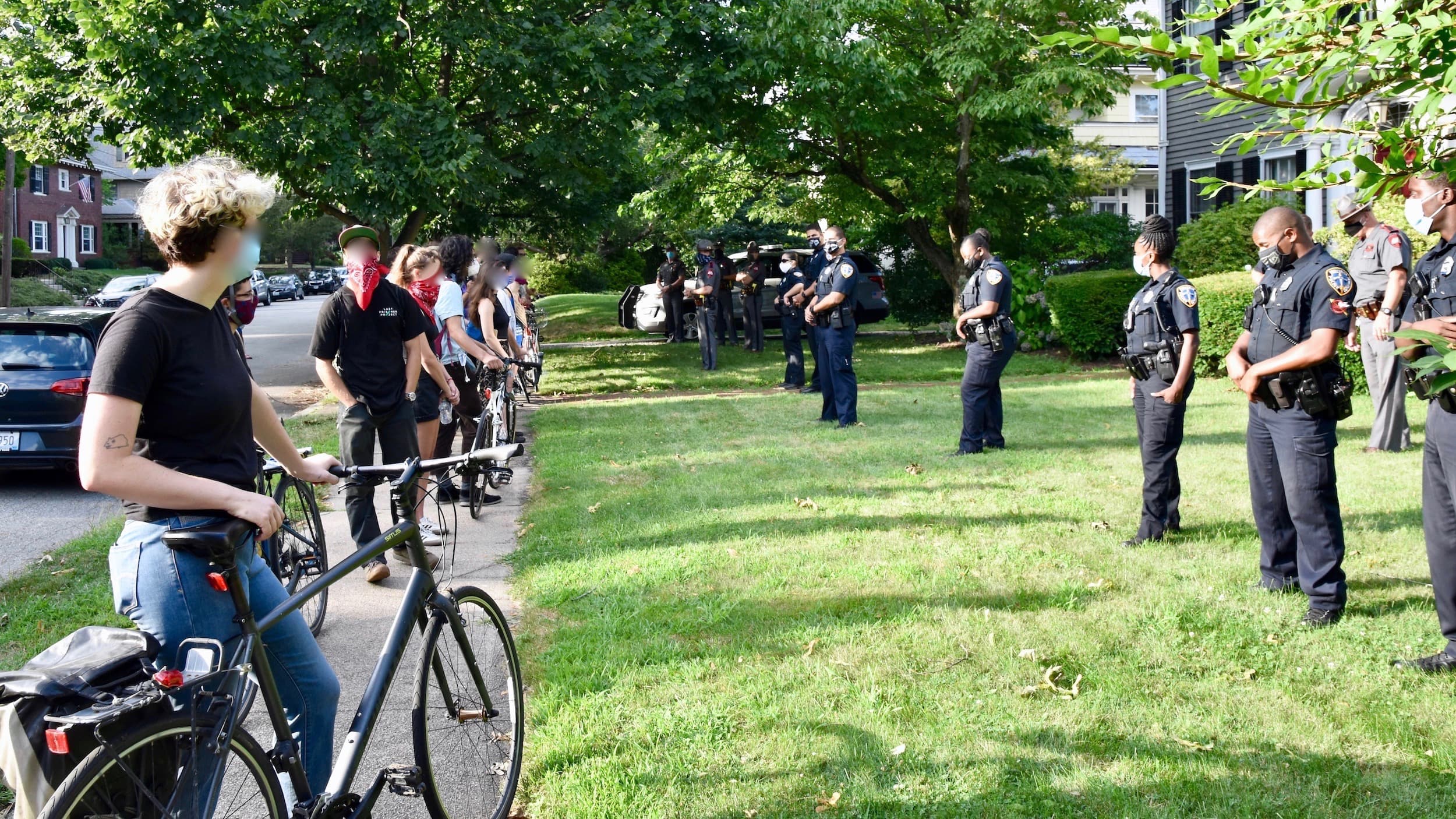Protesters object to Raimondo's Crush COVID police