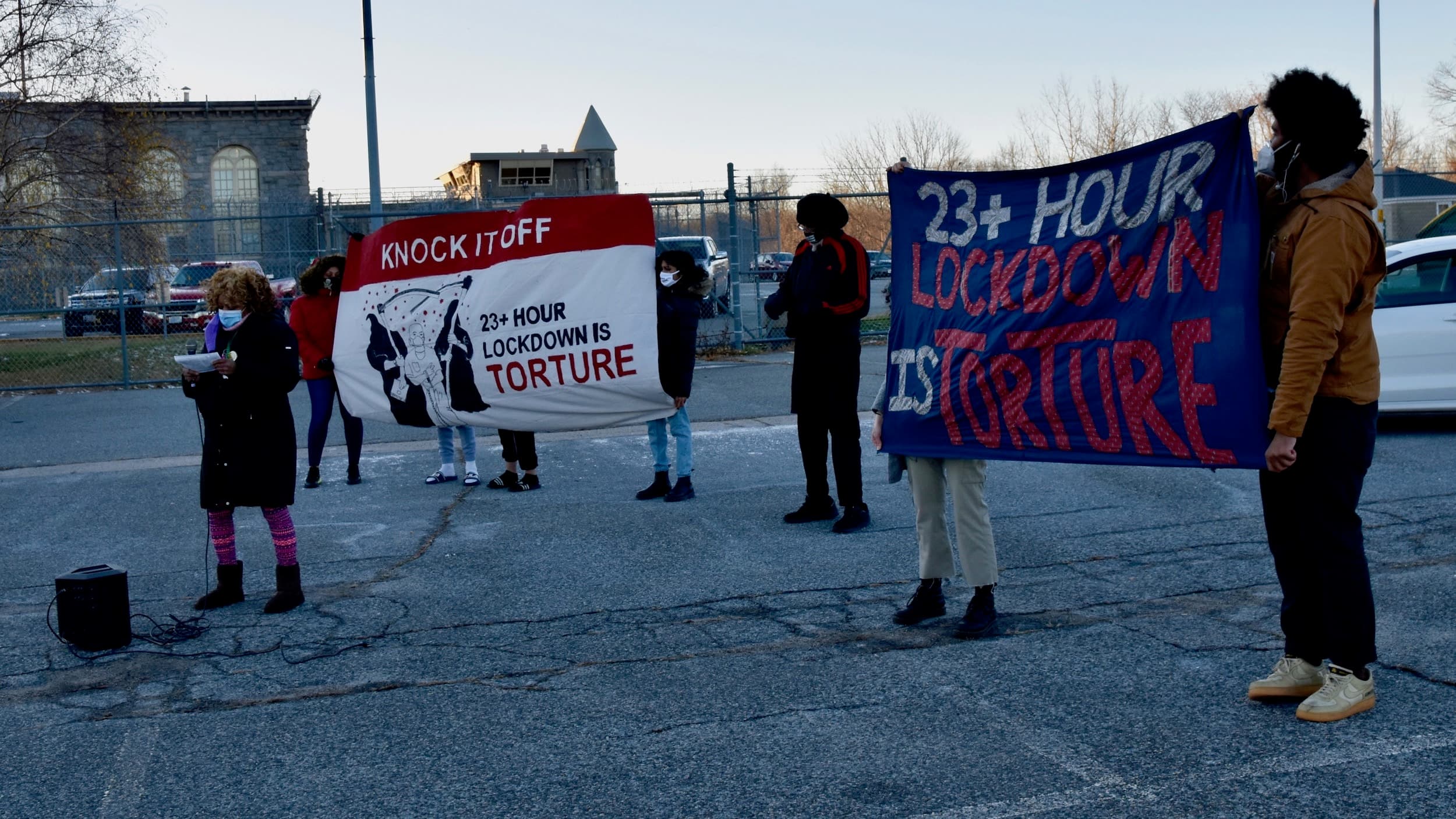 As the pandemic rages inside, advocates, families and allies rally at the ACI