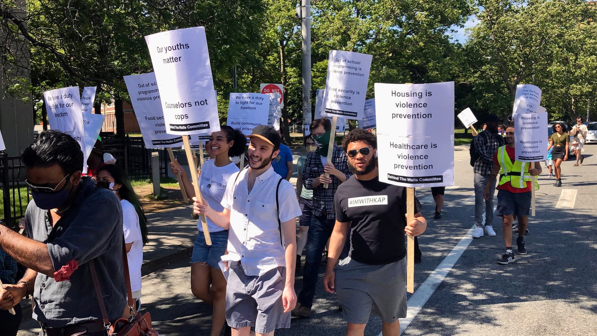 Coalition marches on Nonviolence Institute to demand an end to close cooperation with police