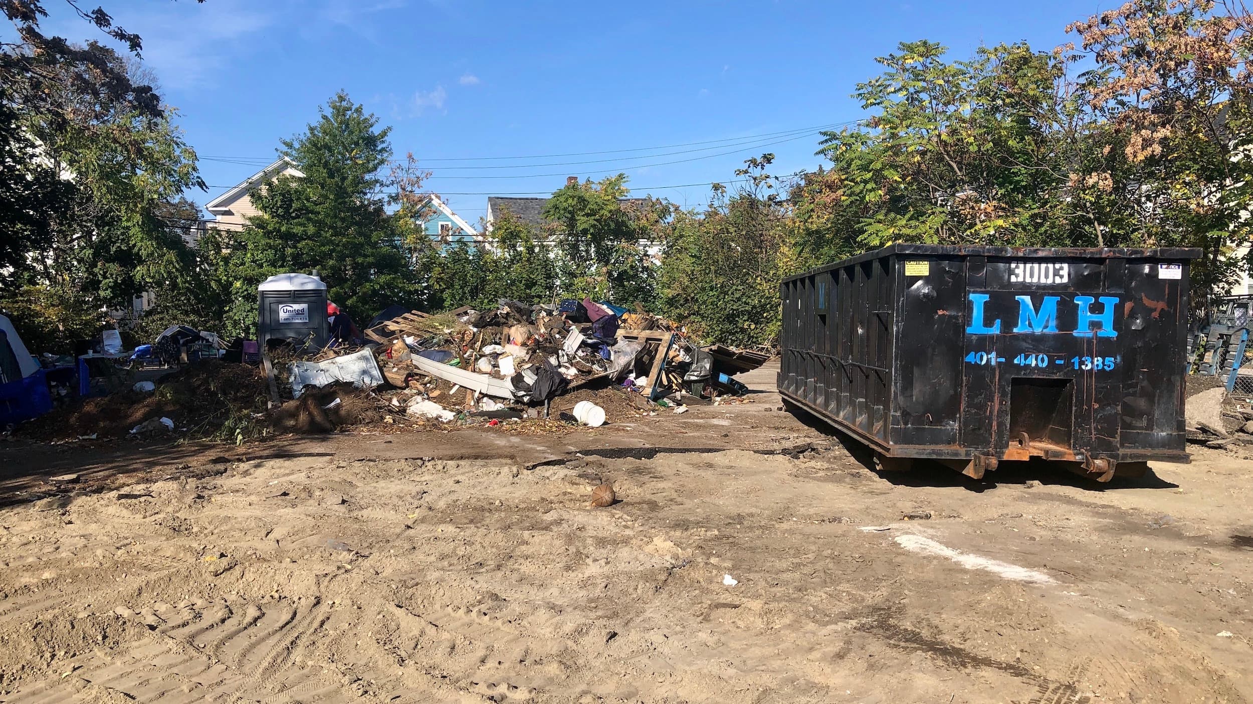 City officials surprised as unhoused encampment on Wilson St is half bulldozed by developer Knight & Swan