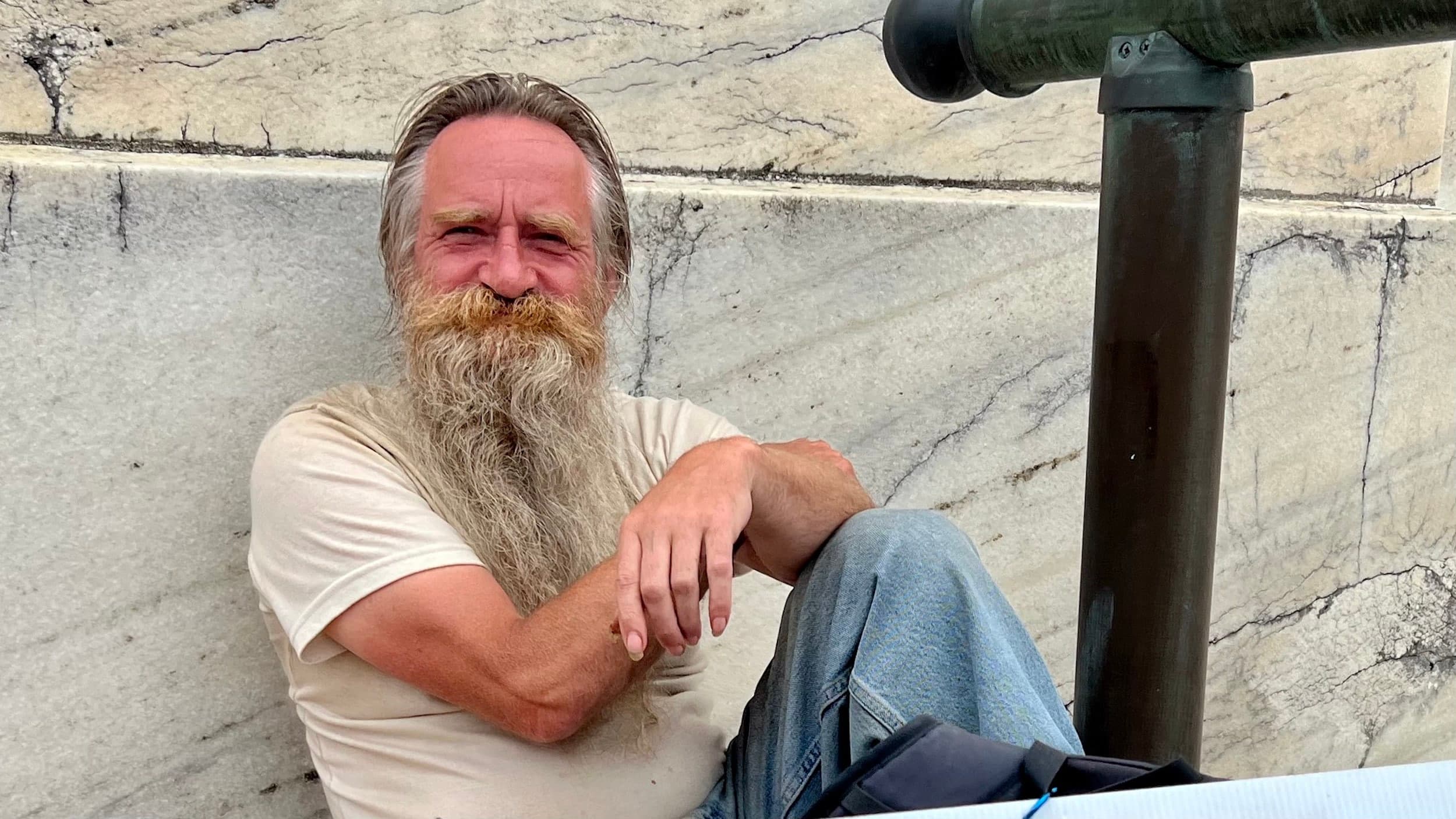 Unhoused, Michael holds a solitary vigil outside the RI State House