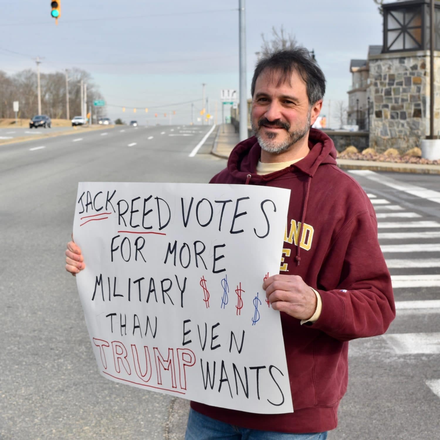 Protesters chide Jack Reed for excessive military spending
