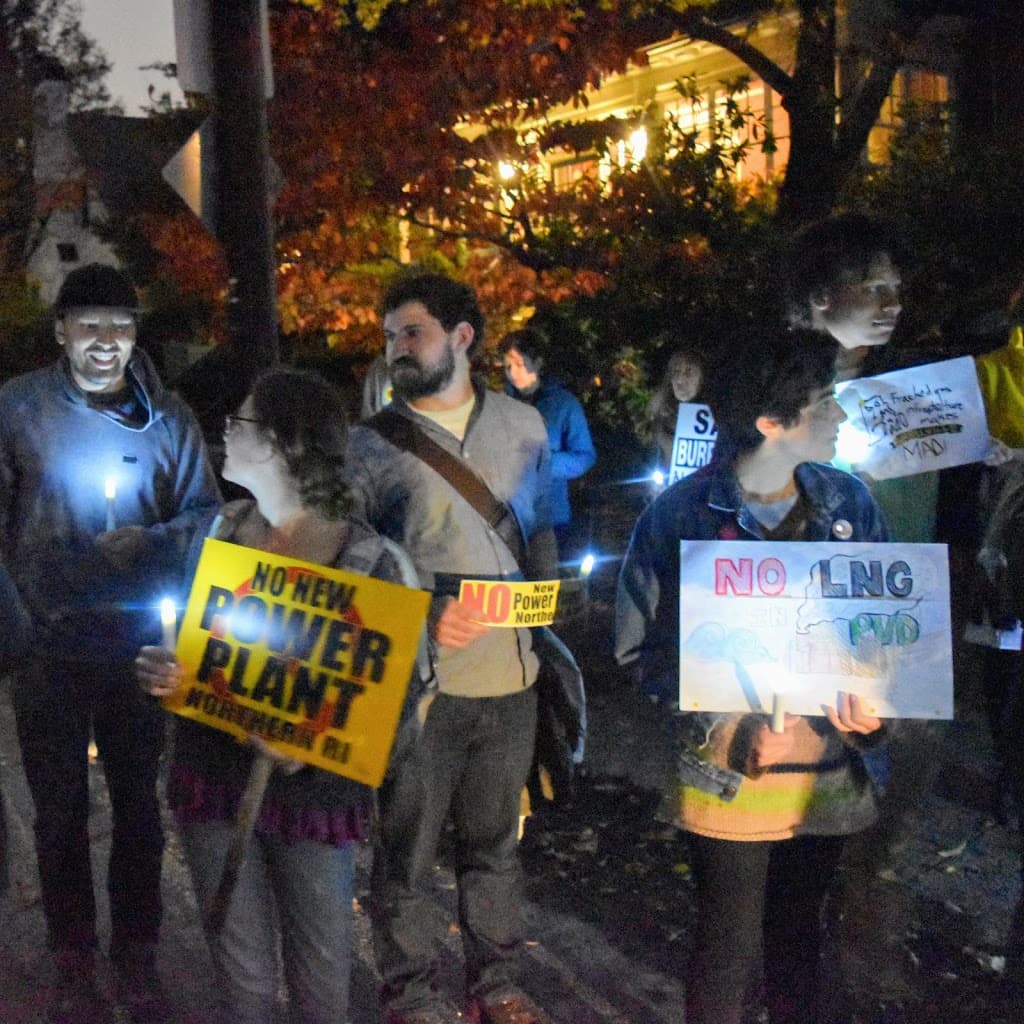 Environmental groups hold vigil outside Governor Raimondo's home