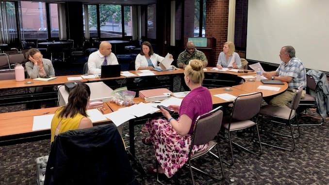 Community members bring complaints about the Providence Police to a PERA Board without a quorum