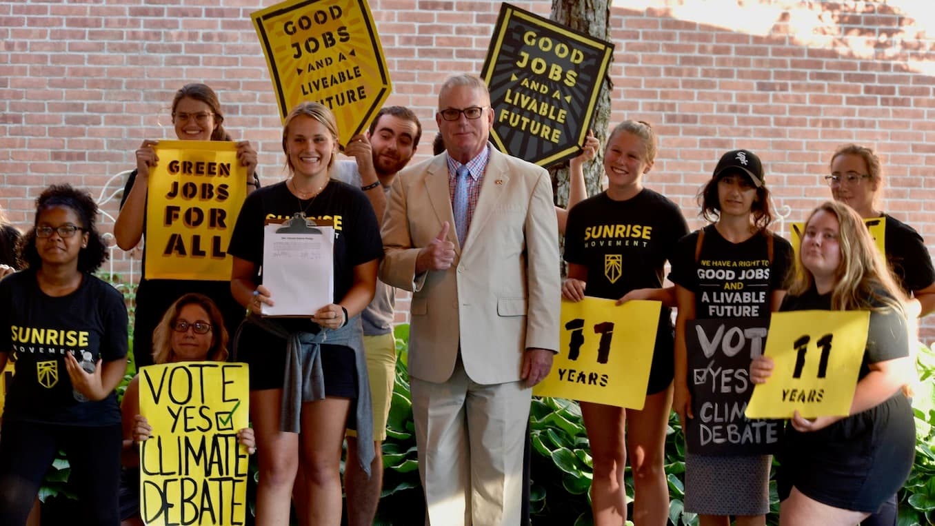 Half of the Rhode Island members of the Democratic National Committee pledge to support an official DNC presidential climate debate in San Francisco next month
