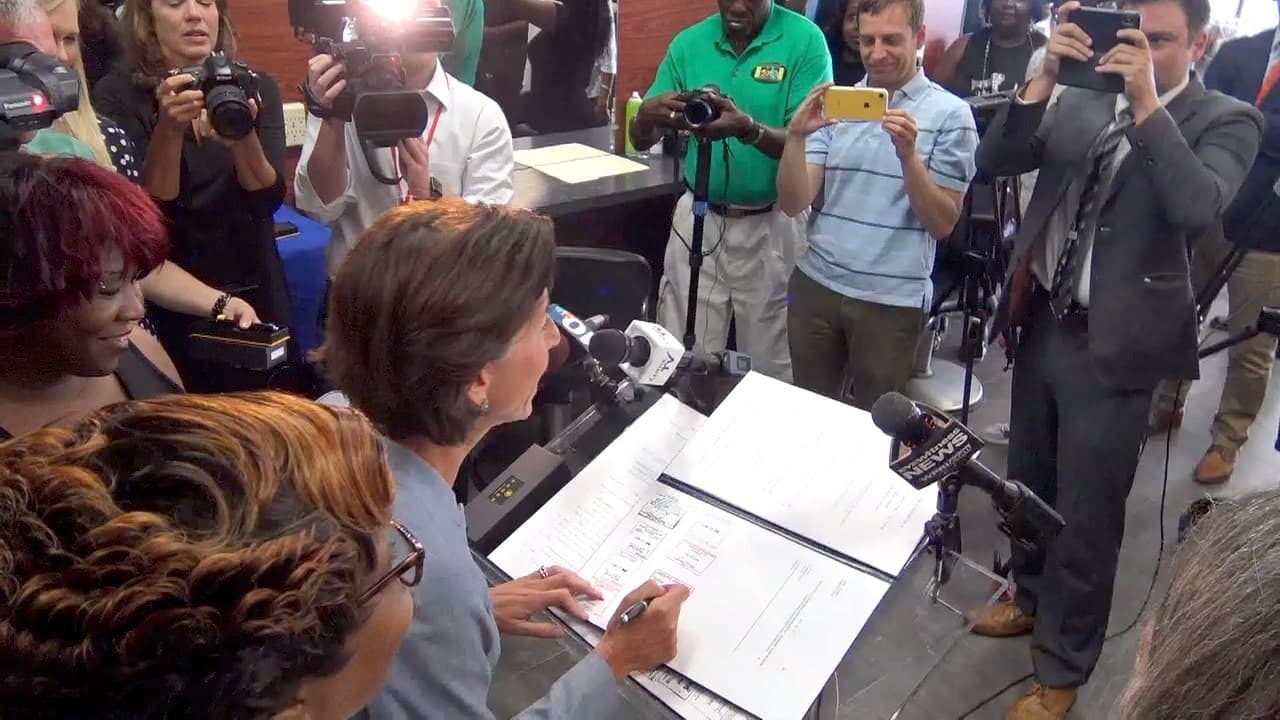 Governor Raimondo signs bill exempting hair braiding from licensing into law