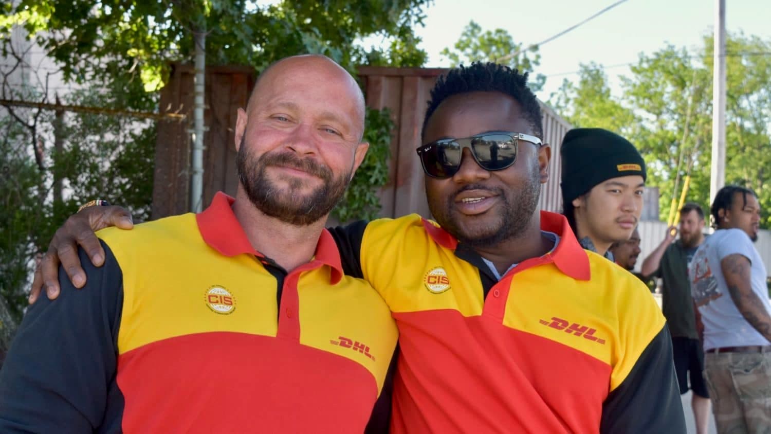 Striking DHL workers picket La Quinta Inn where their out-of-state replacements are staying