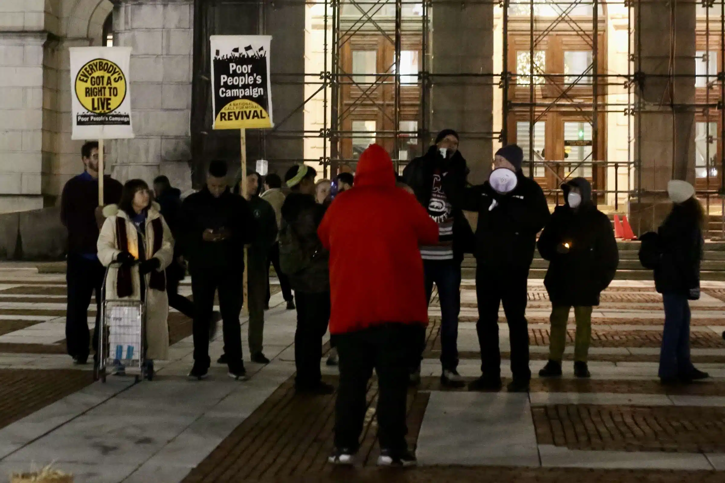 Protesters at a Prayer Vigil opposing Governor Dan McKee's Homeless Encampment Eviction Order