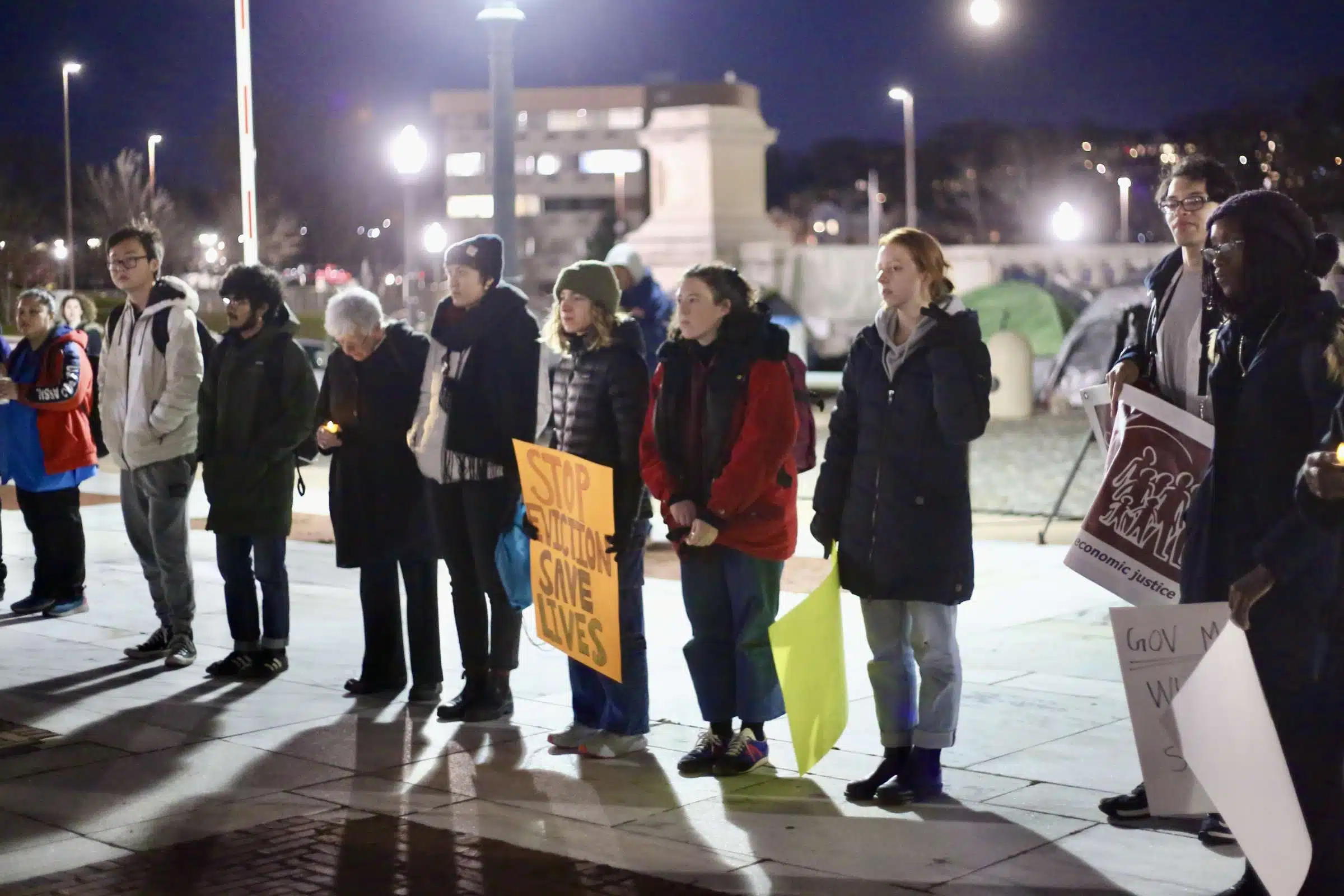 Protesters at a Prayer Vigil opposing Governor Dan McKee's Homeless Encampment Eviction Order