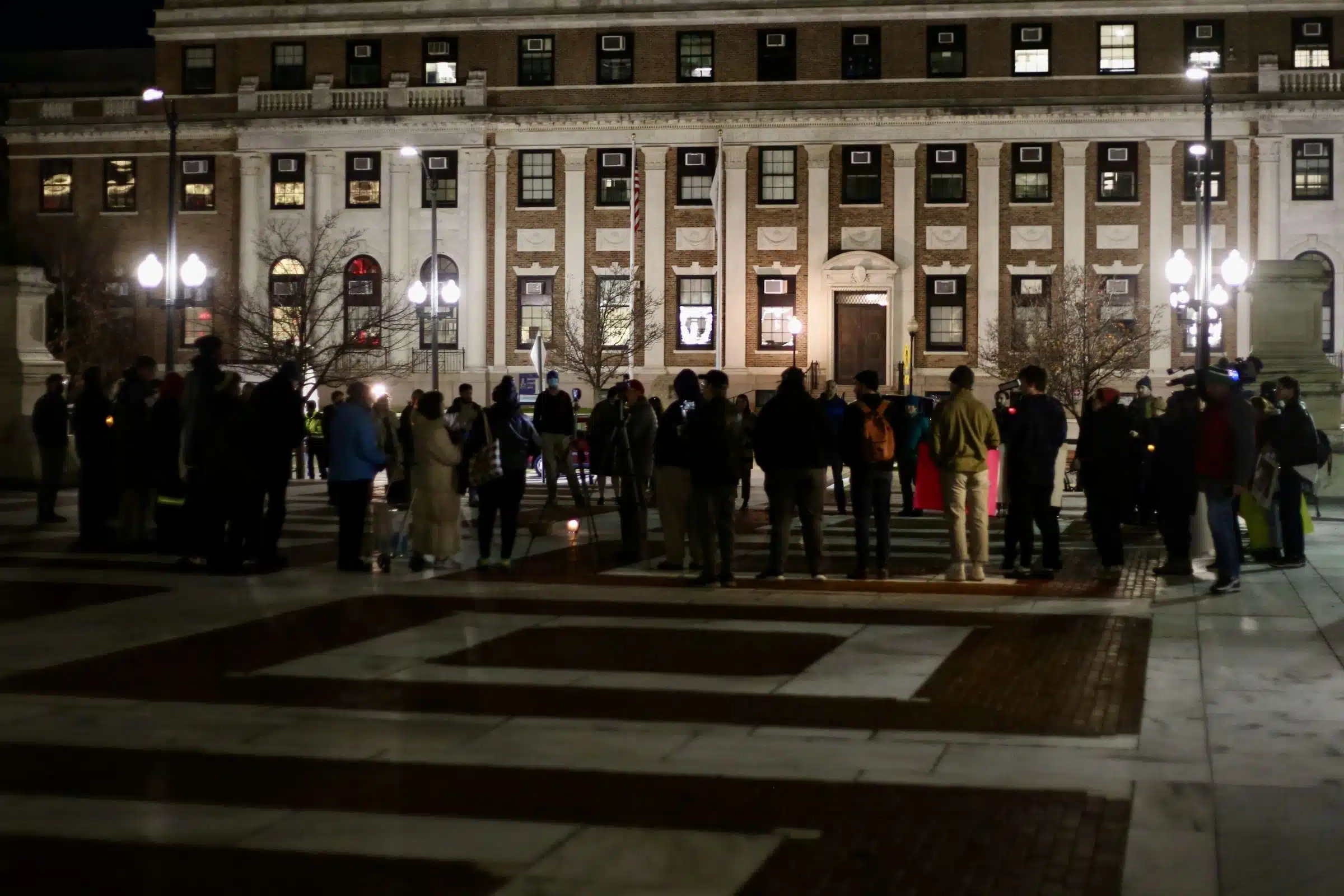 Protesters at a Prayer Vigil opposing Governor Dan McKee's Homeless Encampment Eviction Order