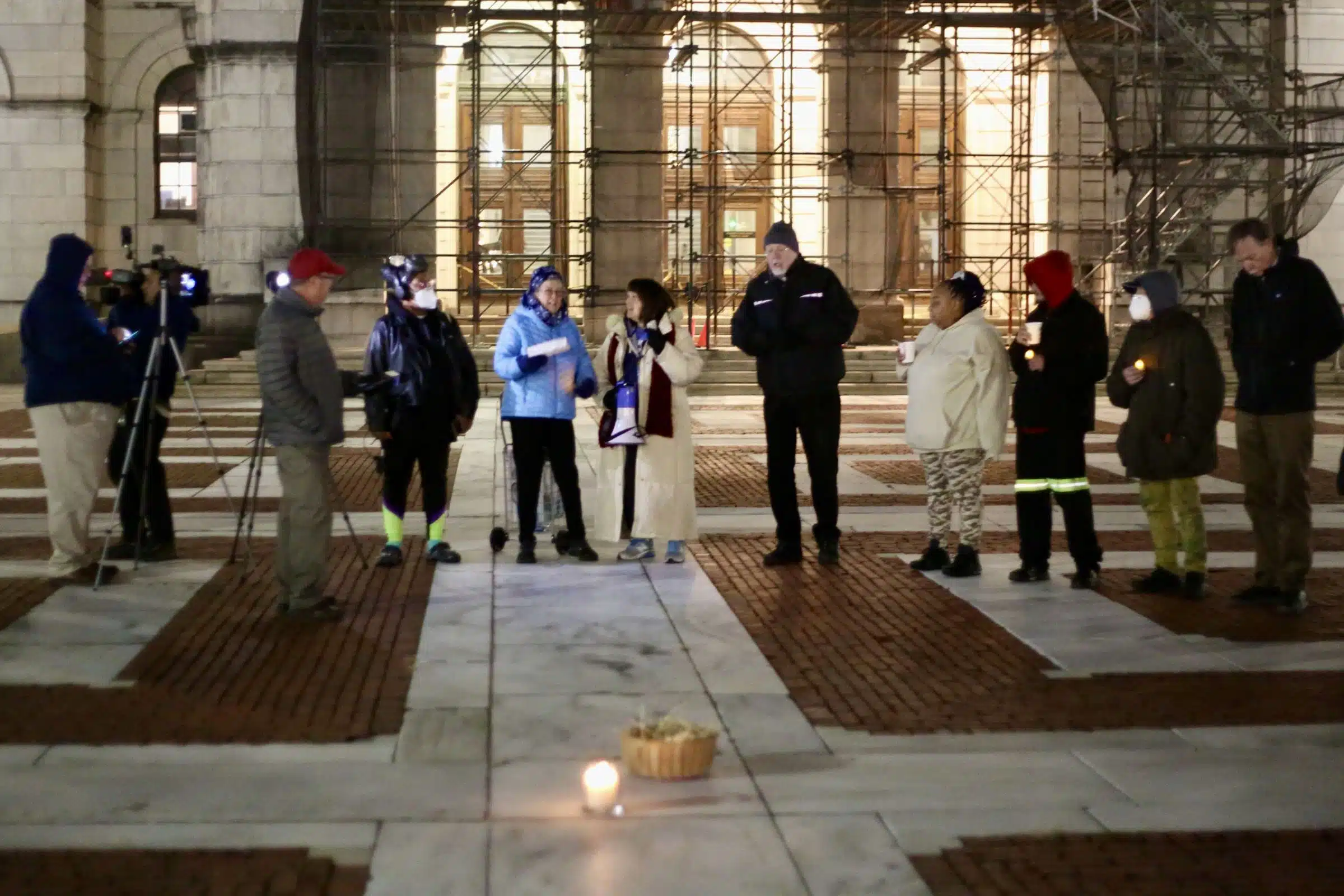 Protesters at a Prayer Vigil opposing Governor Dan McKee's Homeless Encampment Eviction Order