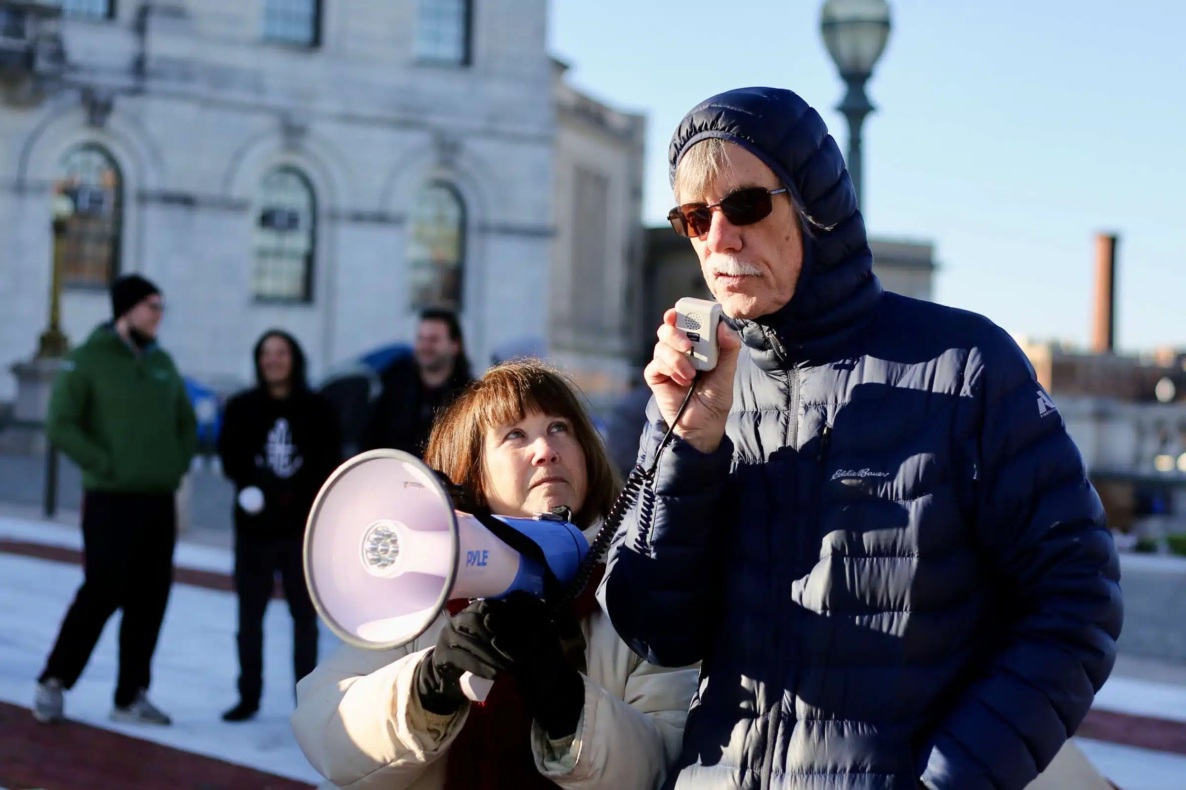 Professor Erich Hirsch at a rally against Rhode Island Governor Daniel McKee, opposing his plan to evict a homeless encampment