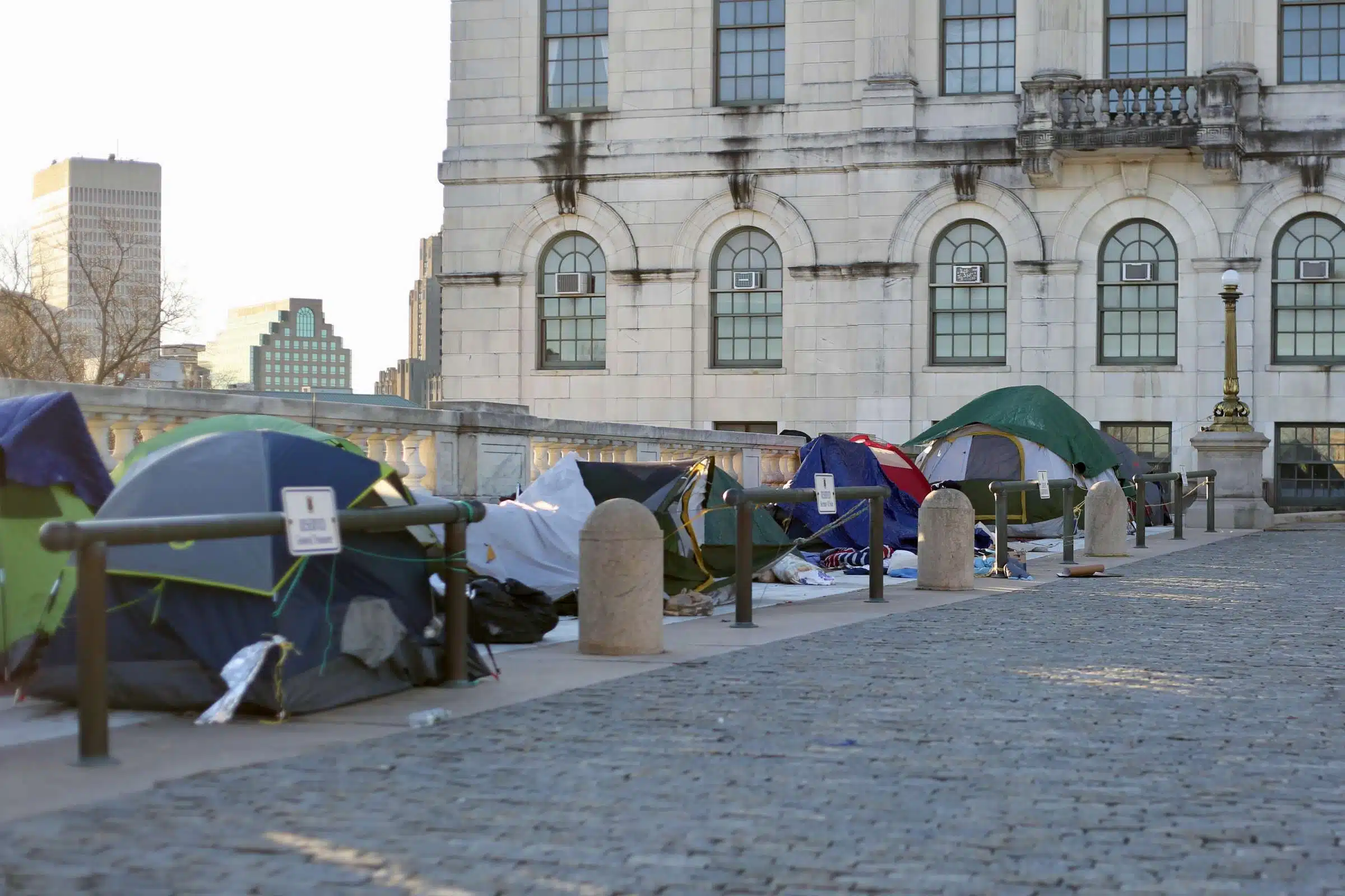 Tents erected by unhoused people outside the Rhode Island State House.